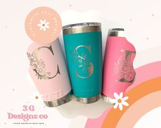 three pink and blue tumblers sitting next to each other