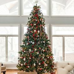 a decorated christmas tree in a living room