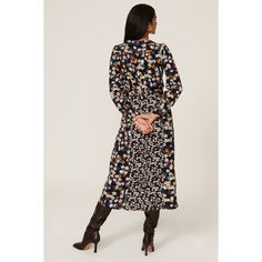 Blue floral crepe (100% Polyester). Hourglass. V-neck. Long sleeves. Back zipper closure. 50" from shoulder to hemline. Imported. Chic V-neck Floral Dress For Fall, Floral Print V-neck Dress For Fall, Fall Fitted Floral Print V-neck Dress, Blue V-neck Midi Dress With Ditsy Floral Print, Elegant Floral Print V-neck Dress For Fall, Blue Floral Print Midi Dress In Viscose, Blue Floral Print Viscose Midi Dress, Floral Print Midi Dress For Work, Elegant Ditsy Floral Print V-neck Midi Dress