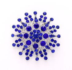 Gorgeous royal blue rhinestone brooch embellishment, which can be used for your DIY project - royal blue sapphire wedding bridal brooch bouquet, gown sash, ring pillow, cake decorations, event decor, crafts, scrap booking and much more! Size: 2 1/4 inch high 2 1/4 inches wide Stone color: Royal blue, sapphire blue Metal: Silver plated This sapphire crystal broach can be ordered with pin in the back to wire into brooch bouquet, add to wedding gown or dress sash, or any number of other craft projects or without the pin as a flat back embellishment for your sew-on, glue-on DIY project. More ROYAL BLUE brooches -  https://www.etsy.com/shop/Crystalitzy?section_id=16200394&ref=shopsection_leftnav_4 Please check for more items in my Shop - https://www.etsy.com/shop/Crystalitzy Please note that th Blue Brooch, Brooch Wedding, Bridal Brooch Bouquet, Blue Wedding Bouquet, Wedding Brooch Bouquets, Flower Guide, Bridal Accessories Jewelry, Dress Sash, Wedding Brooch