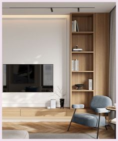 an empty living room with a large tv on the wall and bookshelves in front of it