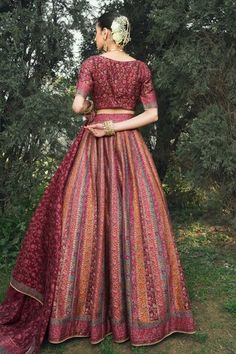 Maroon vegan silk lehenga with an attached cancan and floral weaving pattern. Comes with a padded blouse and a dupatta. - Aza Fashions Tussar Silk Sets For Reception And Navratri, Red Cotton Silk Wedding Sets, Cotton Silk Lehenga With Dupatta For Reception, Festive Tussar Silk Sets For Reception, Tussar Silk Sets With Resham Embroidery For Reception, Cotton Silk Lehenga For Diwali Reception, Cotton Silk Lehenga For Reception And Diwali, Semi-stitched Cotton Silk Choli For Reception, Festive Cotton Silk Lehenga For Reception