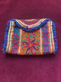 Embroidered afghan wallet - I added a big snap so it closes nicely . Made for the tourist market in 1970s  By 1980 the Russians were there and this business was over I think these are hand made work but maybe hand work with a machine that isn't an automatic computer one Traditional Handmade Brown Pouch, Traditional Brown Rectangular Pouch, Traditional Multicolor Embroidered Pouch Clutch, Traditional Pouch For Daily Use And Festivals, Traditional Embroidered Clutch For Daily Use, Blue Bohemian Rectangular Pouch, Bohemian Handmade Brown Pouch, Handmade Bohemian Brown Pouch, Traditional Hand-stitched Bags For Festival