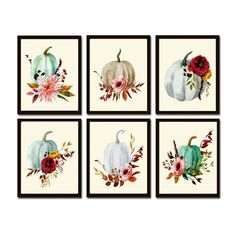 four framed pictures with pumpkins and flowers on them