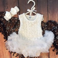 Color Is White. Perfect For Your Baby Princesss For Party, Milestone Pics, Church, Baptism Or Everyday Wear. Full Tutu Skirt Attached To Snap Bottom Romper. Summer Baptism Fitted Tutu Dress, Elegant Fitted Tutu Dress For First Birthday, White Fitted Tutu Dress For Baptism, White Fitted Dress With Matching Headband, Boutique Baby, Baby Boutique, Tutu Skirt, Tutu Dress, Dress Romper