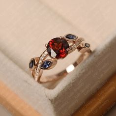 Garnet Ring Round Cut January Birthstone Red Stone Ring | Etsy Elegant Red Sapphire Solitaire Ring, Elegant Red Solitaire Sapphire Ring, Red Ruby Ring In 14k Rose Gold, Ruby Ring In 14k Rose Gold With Round Shape, Red 14k Rose Gold Rings For Anniversary, Elegant Red Sapphire Ring For Anniversary, Elegant Red Sapphire Ring With Round Band, Elegant Red Solitaire Birthstone Ring, Elegant Red Birthstone Ring With Accent Stones