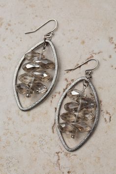 A fun pair of statement earrings, this artisan design rests at approximately 1.75" from sterling silver ear wires. Antique Silver Plated Brass (Lead & Nickel Free) Crystal 2.25" with sterling silver ear wires We hand select our natural materials, thus there may be slight variations in color and/or size that will not detract from the overall aesthetic. Our unique handcrafted designer jewelry for women is made in America, each design created individually in our personal design studio in Floyd, VA Floyd Va, Designer Handmade Jewellery, Earring Ideas, Jewelry Beaded, Artisan Design, Wire Earrings, Designer Jewelry, Teardrop Earrings, Stone Jewelry