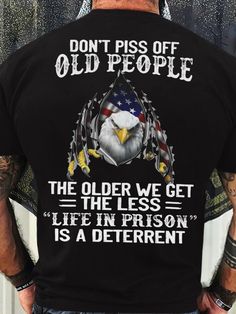 the back of a man's shirt with an eagle and american flag on it