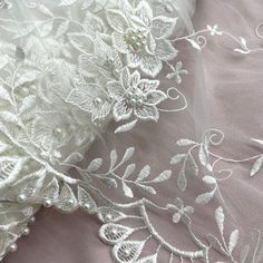 "This luxurious Beaded Lace Fabric Embroidered on 100% Polyester Net Mesh from Lace USA is the perfect choice for those who want to add a little something extra to their wedding dresses, evening gowns, dance costumes, or any other creative projects. Expertly crafted and delicately embellished with beading and sequins, this sumptuous fabric features an ivory background with an ornate pattern. This fabric is sure to impart an exquisite and glamorous look to any ensemble! With its versatility and c Ornate Pattern, Beaded Lace Fabric, Lace Fabrics, Ivory Background, Embroidered Lace Fabric, Bridal Tiara, Champagne Color, Dresses Evening, Fabric Tags