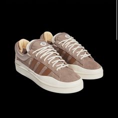 Contoured Outsoles.Bold 3 Stripes. And Casual Style For Days. These Adidas Campus Shoes Uphold Everything You Love About The Classic Campus Design, But This Time With The Unmistakable Look Of A Bad Bunny Collaboration. A Smooth Leather Upper Conforms To Your Foot, And A Soft Interior Lining Keeps Every Step Comfortable. Brown Suede Skate Shoes With Boost Midsole, Beige Sneakers With Leather Sole For Streetwear, Harry Potter Shoes, Adidas Campus Shoes, Campus Shoes, Chuck Taylor Black, Tie Dye Shoes, Vans Suede, Campus Design