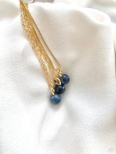 **Each piece in my shop, I personally create and photograph. (All photos are property of The Cord Gallery LLC) Thank you for supporting my small business.Add the perfect minimal touch to any outfit with these stunners! Features a genuine Lapis Lazuli Gemstone Ball pendant with an oversized gold filled connector bail. No two stones with be exactly alike as they are all natural. {Stone sizes are 8mm}These are stunning on their own and look great layered with other pieces. Hangs on your choice of c Ball Pendant Necklace, Indie Jewelry, Lapis Lazuli Gemstone, Figaro Chains, Ball Pendant, September Birthstone, Blue Crystals, Lapis Lazuli, Natural Stone