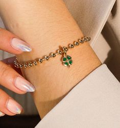 A four-leaf clover charm for when you need luck on your side. A universal symbol of good luck and fortune in your favor. This delicate and dainty charm is a perfect gift for your clumsy friend or your family member who needs a stroke of good news. Wear as a personal reminder on its own or pair with other favorites. Promise Bracelet, Modern Jewellery Design, Foot Bracelet, Clover Bracelet, Everyday Bracelet, Lucky Bracelet, Clover Charm, Pinky Promise, Timeless Gifts