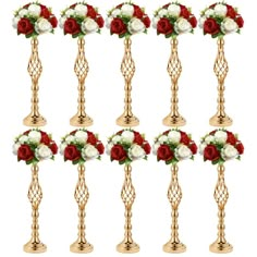 a set of six gold vases with red and white flowers on each one side