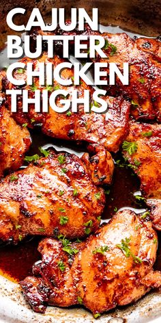 chicken thighs with sauce and parsley in a skillet text reads cajun butter chicken thighs