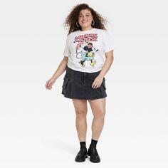 The Women's Disney Minnie Mouse Retro Short Sleeve Graphic T-Shirt - White makes a great addition to your casual wardrobe. It features a cute graphic print of Minnie Mouse, that’s sure to bring a smile on your face. Perfect for casual outings, everyday wear, or music-related events, this Women's Disney Minnie Mouse Retro Short Sleeve Graphic T-Shirt - White is a great pick. Cute Graphic Tees, Retro Shorts, Disney Ladies, Casual Wardrobe, Shirt White, Fitness Fashion, Minnie Mouse, Sleeve Styles, Graphic T Shirt