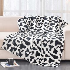 PRICES MAY VARY. SOFTER AND WARMER: BNuitland Cow Blanket is made of 300 GSM super soft high quality Flannel, Our double-sided cow blanket is made of 100% skin friendly which keep you warm in the upcoming cold days. You can use the Cow Print Throw for Wearable Blanket, Sofa Throw, Bed Blanket, Travel Blanket, Pet Blanket, Picnic Blanket, bed decoration and so on. PERFECT GIFT: Our Cow Print blanket is a real fantastic gift for kids, Teenagers, Adults, Girls, Women or anyone you cherished. Perfec Cowhide Blanket, Black And White Bed, Cow Print Blanket, Mom Bedroom, Sofa Cozy, Adult Blanket, White Bed, Small Blankets, Blanket Black