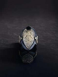 Silver Free Size Dragon Ring, Handmade Dragon Men Ring, Dragon Ring in Sterling Silver, Mythical Creature Ring, Handcrafted Gothic Ring Men Each Servet Jewellery piece is crafted with love, patience and meticulousness. 100 % HANDCRAFTED 100 % SERVET JEWELLERY ★ MORE INFORMATION * Luxury Warrior Mask Dragon Free Size Ring (LXR/R-279) * Gender : Male & Female * Material : 925K Sterling Silver * Stone : Black Zirconium * Total weight : 10 - 13 Grams * For any size smaller or larger than the once provided above PLEASE CONTACT US! ★ LUXURY SERVET JEWELLERY GIFTBOX In order to avoid tarnishing, please avoid your jewellery from water, air pollution, sweat and cosmetics. When you are not using jewellery, please keep it in original velvet pouch. Warrior Mask, Gothic Ring, Dragon Ring, Mythical Creature, Gothic Rings, Ring Men, Men Ring, Velvet Pouch, Air Pollution