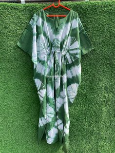 Indian Hand-Tie Dye Print Kaftan Dress, Summer Cotton Caftan, Boho Hippie Style, Beach Wear, Night Wear Gown, Caftan Dress, Women's Dress, Measurements : Bust-50 inches (one size Fits all) Length in inches :- Below the knee:- 52 inches , Mid-Calf :- 42 inches, Above the knee :- 32 inches Size: Free Size Kaftan Color: Multi-color as Shown in Image. Note: The color and brightness of actual product may vary due to digital photography and photo editing. We crossed check each and every product before listing. If you have any inquiry feel free to message us. Payment policy: We accept the payment by paypal. International buyers are responsible for their countries duties and taxes. Shipping Policy We ship the Item Worldwide By DHL Express, Fedex & Indiapost. Thanks for your time. Casual Summer Thobe With V-neck, Green Tunic With Kimono Sleeves, Green Bohemian Tunic Kaftan, Green Short Sleeve Tunic For Vacation, Green Summer Kurta Tunic, Green Tunic-style Kurta For Summer, Green Summer Tunic Kurta, Green Long Kaftan For Festival, Long Green Kaftan For Festival