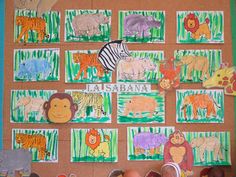 children's artwork displayed on bulletin board with pictures of different animals and their names