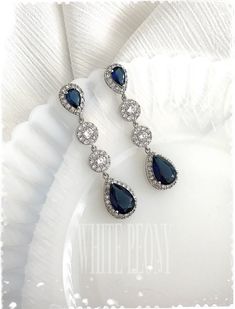 "Something blue for your special day Vintage Art Deco style sapphire blue crystal drop dangle earrings : \"MARGOT long\" by ©White Peony by KC. These beautiful earrings are made of AAA quality sapphire blue and clear Cubic Zirconia (zircon, CZ) Simulated Diamond / white gold plated components. Please note that product colors in photos may appear slightly different on various computer monitors/smart phones/tablets. Contact my shop if any additional photos are needed. The earring measures approx : Elegant Blue Crystal Teardrop Earrings, Blue Drop Bridal Earrings For Formal Events, Blue Drop Bridal Earrings For Formal Occasions, Blue Drop Jewelry For Wedding, Blue Drop Bridal Earrings, Blue Crystal Dangle Bridal Earrings, Elegant Blue Drop Bridal Earrings, Blue Cubic Zirconia Teardrop Earrings For Wedding, Blue Cubic Zirconia Teardrop Earrings