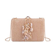 Dive into summer elegance with our Raffia Clutch featuring assorted seashell accents and a stylish chain crossbody strap. This beach-inspired accessory combines the natural charm of raffia with the whimsy of assorted seashells, creating a unique and fashionable statement piece. The chic chain crossbody strap adds a touch of modern flair, making it a versatile companion for both casual outings and special occasions. Embrace the coastal vibes and elevate your style with this one-of-a-kind clutch, Summer Beach Bags Made Of Shell, Chic Gold Straw Bag, Elegant Straw Beach Bag, Rectangular Straw Bag With Chain Strap For Vacation, Beige Chain Strap Beach Bag, Beaded Beige Straw Bag, Elegant Rectangular Straw Bag With Chain Strap, Summer Beach Straw Bag With Chain Strap, Beach Beaded Beige Straw Bag