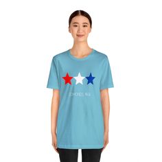 Get ready for summer. Show your Edmonds patriotic spirit with this red white and blue star design. Perfect for the beach and summer BBQs in normaltown USA - get out and Love Edmonds! This classic unisex jersey short sleeve tee fits like a well-loved favorite. Soft cotton and quality print make users fall in love with it over and over again. These t-shirts have-ribbed knit collars to bolster shaping. The shoulders have taping for better fit over time. Dual side seams hold the garment's shape for Star T Shirt, Get Ready For Summer, Star Design, Blue Star, Star Designs, Red White And Blue, Jersey Shorts, Fall In Love, Light Fabric