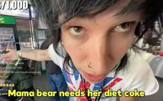 a woman making a funny face with her tongue out and the caption'mama bear needs her diet coke '