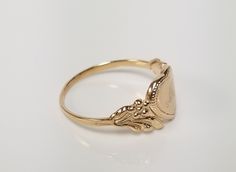 "Thanks for shopping our vintage estate store. We tend to sell well below wholesale and truly hope you enjoy all of our items. Many of the items are one of a kind, so please enjoy scrolling through the pictures and hopefully something will catch your eye. Brown spots are from camera or reflections. Estate 14k yellow gold monogram cursive capital M heart ring. Custom made ring for our shop. Ring size: 3 Setting: 7.5mm 1/4\" to 3/8\" Band width: 1.4mm Weight: 1.09 grams Marked 14k and it's sweet. Classic Gold Initial Ring Collectible, Vintage Yellow Gold Hallmarked Jewelry, Antique Personalized Rings For Formal Occasions, Gold Engraved Initial Ring Collectible, Gold Engraved Initial Ring, Antique Initial Ring With Polished Finish For Anniversary, Vintage Yellow Gold Hallmark Engraved Ring, Vintage Gold Initial Ring Stamped 14k, Vintage Yellow Gold Engraved Ring With Hallmark