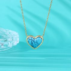 Lending a cool vibe to your look, this necklace makes a fitting choice for everyday wear. We love the textured heart shaped blue stone which gives it a touch of premium appeal while maintaining its elegance. It is suspended from a yellow gold tone sterling silver chain. Whether chosen as a gift or just for you, the details of this necklace were designed to be adored. Pair the heart-cut turquoise necklace with your favorite delicate pieces for a lovable layered look.Carat Weight: 2.1 ctStone Size Blue Heart Pendant Clavicle Chain Jewelry, Turquoise Heart-shaped Necklaces For Gifts, Turquoise Heart-shaped Necklace For Gift, Turquoise Heart Necklaces For Gift, Blue Heart-shaped Clavicle Chain Necklace, Blue Heart Shaped Clavicle Chain Necklace, Blue Heart Clavicle Chain Necklace, Elegant Blue Open Heart Necklace, Turquoise Necklace With Heart Beads For Gifts