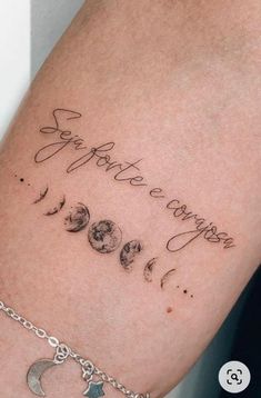 a woman's arm with some writing on it