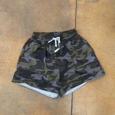 Summertime Is Here....... These Super Soft Camo Drawstring Shorts With Pockets Are Perfect For A Casual Day Out Or In. Slip Them On With A Tank And Sneakers And You Are Ready For Your Day To Begin. The Pockets Are Deep, So They Are Perfect For Your Phone, Lip Gloss And Keys. 90% Polyester & 10% Spandex Camouflage Cotton Bottoms With Elastic Waistband, Summer Camouflage Bottoms With Elastic Waistband, Camouflage Bottoms With Elastic Waistband For Summer, Sporty Camouflage Bottoms With Pockets, Casual Camouflage Bottoms With Built-in Shorts, Athleisure Shorts, Womens Camo, Ribbed Shorts, Neon Coral