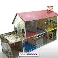 the doll house is made out of cardboard and has an open floor plan to make it look like a dollhouse