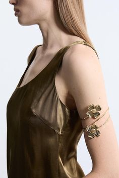 Add Intricate Detail To Any Occasion Look With Our Arm Cuff. Featuring A Large, Floral Design, This Cuff Is Perfect For Injecting Some Personality Into Your Look. Wear Them On Wedding Guest Days, To Party Nights, And Holiday Evenings. Metal Flower Arm Cuff Shimmering, Metallic Colouring Three Dimensional Floral Detailing Unique Cuff Design Statement Large Size Flower Arm Cuff, Arm Cuff Jewelry, Gold Arm Cuff, Petite Wedding Guest Dresses, Upper Arm Cuff, Upper Arm Cuffs, Latest Bracelets, Design Journal, Cuff Design