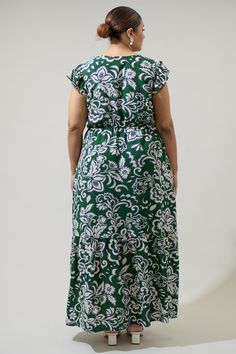 Fall in love one more time with the Harriet Floral Pismo Button Down Flutter Maxi Dress! This green long dress has a V neckline that leads to a functional button front. Ruffle cap sleeves frame a flowy skirt with a single bottom tier that splits near the knee. Wear it with white heels to create a fashionable statement. - Cap sleeves- Lined- Button front- Deep V- Color: Cream GreenSize + Fit - Model is 5'10" and wearing size 2X- Measurements taken from size 2X- Chest: 25 1/2"- Length: 59" Fabric Buttoned Maxi Dress For Garden Party, Sleeveless Green Midi Dress With Button Closure, Green V-neck Maxi Dress With Button Closure, Green Midi Dress With Flutter Sleeves, Green V-neck Maxi Dress For Garden Party, Green Buttoned Dress For Garden Party, Green Maxi Dress With Button Closure, Vacation Green Maxi Dress With Button Closure, Green Maxi Dress With Button Closure For Vacation