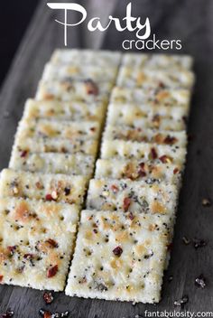 crackers on a wooden table with text overlay that reads party crackers recipe