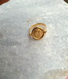 Double Face Coin Ring made of 925 sterling silver coated with 14k gold layers. Dainty ring designed based on the ancient greek symbol Greay Alexander and Godess Athina.  Appropriate either for everyday or formal looks. Also available in 925 Sterling Silver. Find similar rings here: https://www.etsy.com/listing/770492008/phaistos-disc-opal-ring-sterling-silver?click_key=854069b5801e826735cbc91136574f854413d225%3A770492008&click_sum=da5d808d&ref=shop_home_active_11&pro=1&frs=1 https://www.etsy.com Gold-colored Sterling Silver Engraved Open Ring, Gold-color Open Ring Engraved Sterling Silver, Gold-color Sterling Silver Engraved Open Ring, Gold Sterling Silver Engraved Open Ring, Gold Hammered Stackable Rings For Promise, Gold Spiritual Signet Ring For Promise, Spiritual Gold Signet Ring For Promise, Brass Round Band Jewelry Gift, Gold Spiritual Stackable Toe Rings