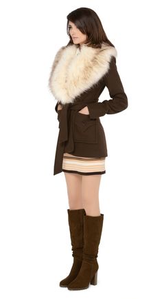 SALE! Immediately striking seventies winter jacket with indistinguishable from the real thing cruelty free cream oversized faux fur collar, top stitched deep essentials front pockets and belt closure. Cozy, comfy and cool. Pairs well with our 1970s Style Jersey Dress to complete the look. Unsure of your size? Use our chat feature. The model pictured is 177 cm tall and wears a size XS. Fabric content: 20% VW / 80% AC, Lining: 95% Polyester / 5% Elastane. Fabric provides no stretch. Belt closure. Fitted Winter Outerwear With Belted Cuffs, Winter Outerwear, Belted For Cold Weather, Fall Fur Coat With Padded Collar For Cold Weather, Winter Belted Outerwear For Cold Weather, Chic Winter Outerwear With Belted Cuffs, Winter Outerwear With Belt For Cold Weather, Chic Winter Outerwear With Faux Fur Trim, Brown Belted Winter Outerwear, Belted Long Sleeve Fur Coat For Fall