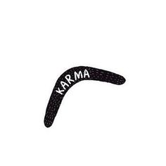 an arm with the word karma written on it in black and white letters, against a white background