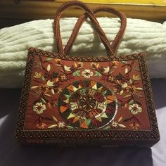 Rust Unique Sequin Handbag Features Embroidered Flowers And Leaves. Would Look Great With Any Type Of Chinese Outfit. I Think They Are Called Sari's Or Cute Accessorie For A Rust Boot, Heel Or Sandals With Jean's And A Cute Top. Price Firm Size 10in Length 7.5 Height 2.25 Width Orange Double Handle Evening Bag, Traditional Orange Tote Bag, Embroidered Brown Shoulder Bag For Shopping, Brown Embroidered Shoulder Bag For Shopping, Brown Embroidered Shoulder Bag, Evening Embroidered Brown Shoulder Bag, Traditional Orange Rectangular Bag, Embroidered Brown Tote Satchel, Brown Embroidered Handheld Shoulder Bag