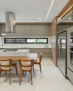 the kitchen is clean and ready to be used as a dining room or family room