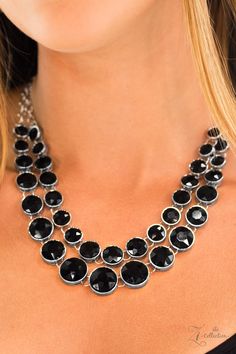 Radiating with faceted shimmer, glittery black rhinestones join into two timeless layers below the collar. Encased in sleek silver frames, the sparkling black gems gradually increase in size as they trickle toward the center for an iconic finish. Features an adjustable clasp closure. Sold as one individual necklace. Include one pair of matching earrings. Black Gems, Rhinestone Statement Necklace, Silver Frames, Purple Rhinestone, Paparazzi Accessories, Black Necklace, Paparazzi Jewelry, Black Rhinestone, Rhinestone Necklace