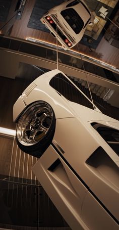 an overhead view of a white sports car