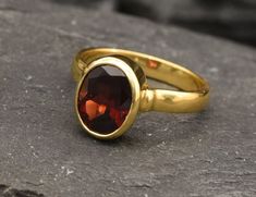 Gold Garnet Ring set with a Natural Garnet in a perfect diamond cut & a deep red color, at 10x8mm, 3 Carats, sourced from Mozambique.  Red Antique Ring design made of Gold Vermeil ☞ thickest 18k Gold Plating on top of Solid 925 Sterling Silver ☞ made to last. ☞ Choose your size ☞ I resize (before shipping) for FREE to Any size* Matching Earrings & Matching Pendant - please ask me January Birthstone - Genuine & Natural Stones ❀ ⌛Last Ring left ⌛   ❀ Each Natural Gem is unique & will have Slight v Red Oval Sapphire Birthstone Ring, Formal Red Sapphire Ring With Oval Shape, Formal Red Oval Sapphire Ring, Oval Garnet Ruby Ring As Gift, Red Oval Hallmarked Birthstone Ring, Red Oval Birthstone Ring Hallmarked, Red Oval Sapphire Ring As A Gift, Red Oval Sapphire Ring Gift, Red Sapphire Oval Ring For Gifts