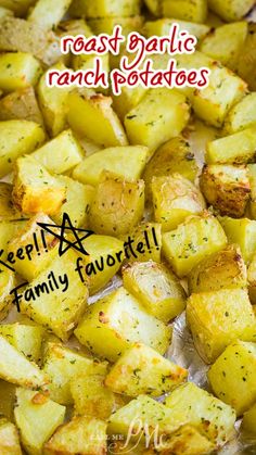 roasted potatoes with herbs and seasoning in a skillet on a baking sheet that says roast garlic and ranch potatoes keep family favorite