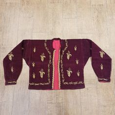 Antique embroidery textile jacket. Antique cepken, jacket hand embroidered with gold threads on velvet. Velvet color ; Cherry,Wine colors *Handmade *Perfect condition Sizes: waist size: 20 inches ,51 cm complete size : 59 inches,149 cm arm size only : 20 inches,50 cm height : 19 inches,47 cm Ceremonial Velvet Traditional Wear With Resham Embroidery, Velvet Traditional Wear With Resham Embroidery For Ceremonial Occasions, Traditional Long Sleeve Velvet Wear, Traditional Long Sleeve Wear For Festival, Bohemian Long Sleeve Habesha Kemis For Festive Occasions, Festive Long Sleeve Habesha Kemis For Ceremonial Occasions, Embroidered Long Sleeve Outerwear For Costume, Long Sleeve Embroidered Traditional Wear For Festivals, Traditional Embroidered Habesha Kemis For Ceremonial Use