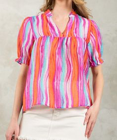 This bright and cheerful top features a wave stripe pattern, v-neckline and short sleeves. The perfect pop of color for summer, this top can be styled for work or play. 75% Tencel, 20% nylon, 5% linen Model is wearing a size small and is 5'9" FINAL SALE - CANNOT BE RETURNED OR EXCHANGED Round Top Collection, Patriotic Dresses, Athleisure Leggings, Sewing Vintage, Patriotic Fashion, Maxi Dress Navy, Linen Spray, Stripe Top, Sleeveless Maxi Dress