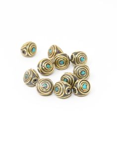 brass plated metal beads with turquoise stones