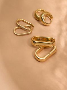 Elevate your jewelry staples with this chic pack of 18K gold dipped earrings, featuring a variety of oval shaped hoops. Jewelry Staples, Gold Dipped, Accessories Jewelry Earrings, Earring Set, 18k Gold, Jewelry Accessories, Twist, Jewelry Earrings, Gold