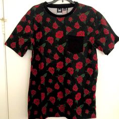 This Is A Brand New Tee Shirt That Has Never Been Worn Before Black Floral Print Tops For Streetwear, Black Cotton Tops With Rose Print, Red Cotton Tops With Rose Print, Trendy Black Top With Rose Print, Rose Print Crew Neck Top For Streetwear, Black Graphic Tee Shirt With Floral Print, Black Graphic Tee With Floral Print, Red Rose Print Cotton Tops, Casual Cotton T-shirt With Rose Print