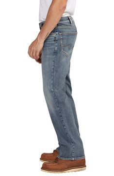 Washed and faded like a pair of old favorites, these jeans cut from cotton-blend denim feature a relaxed, roomy fit with a touch of stretch for added comfort. 19" leg opening; 11" front rise (size 32 x 32) Zip fly with button closure Five-pocket style 92% cotton, 7% polyester, 1% elastane Machine wash, tumble dry Imported Faded Rigid Denim Jeans Standard Cut, Non-stretch Denim Jeans With Zip Fly, Relaxed Straight Leg Jeans, Non-stretch Medium Wash Jeans With Five Pockets, Rugged Five-pocket Jeans In Rigid Denim, Pre-washed Indigo Cotton Jeans, Silver Jeans, Straight Leg Jeans, Leg Jeans